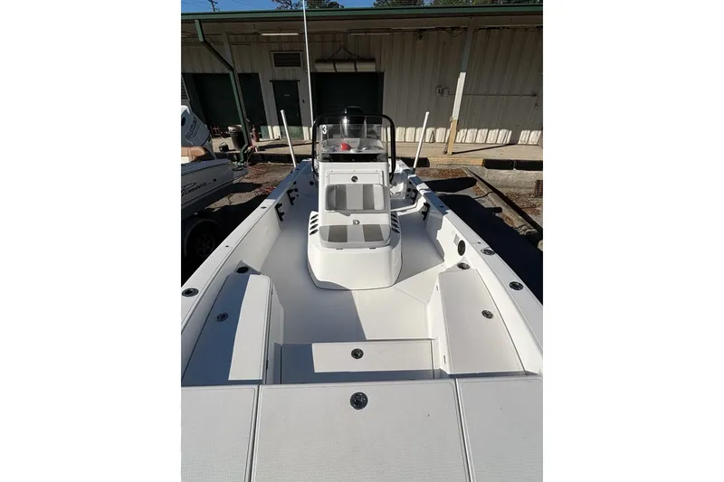 Slide: The Image of 2018 BlackJack 224 boat with sleek white deck and center console. - 10