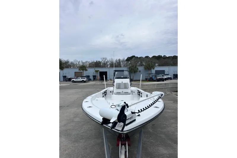 Slide: The Image of 2018 BlackJack 224 boat in a parking lot, showcasing sleek design and modern features. - 8