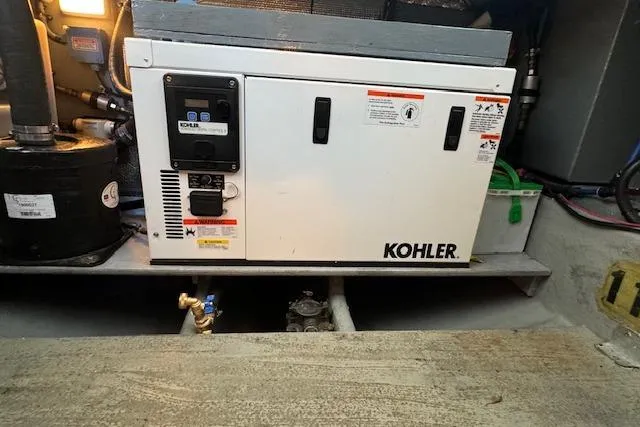Slide: The Image of Kohler generator in 2003 Sea Ray 290 Amberjack engine room. - 20