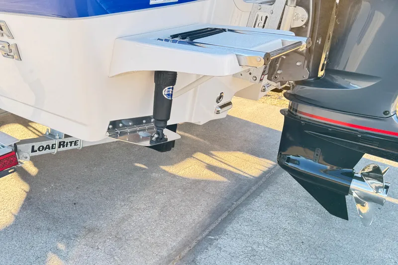 Slide: The Image of 2026 Carolina Skiff 21 Ultra Elite boat with Load Rite trailer and outboard motor. - 8