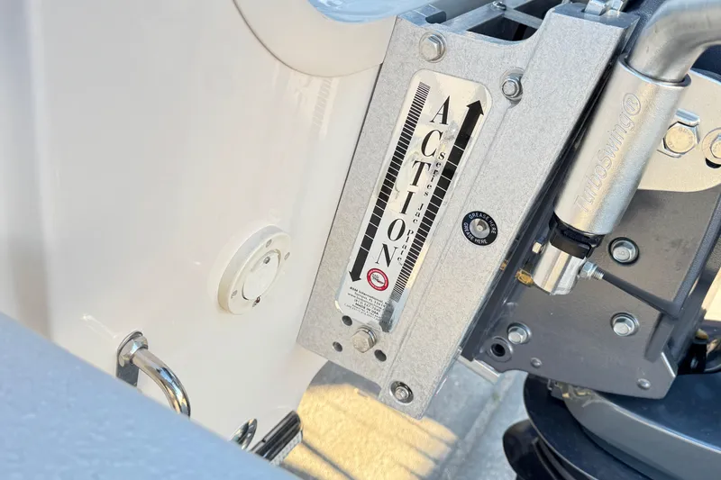 Slide: The Image of Close-up of 2026 Carolina Skiff 21 Ultra Elite boat engine mount and TurboSwing attachment. - 9