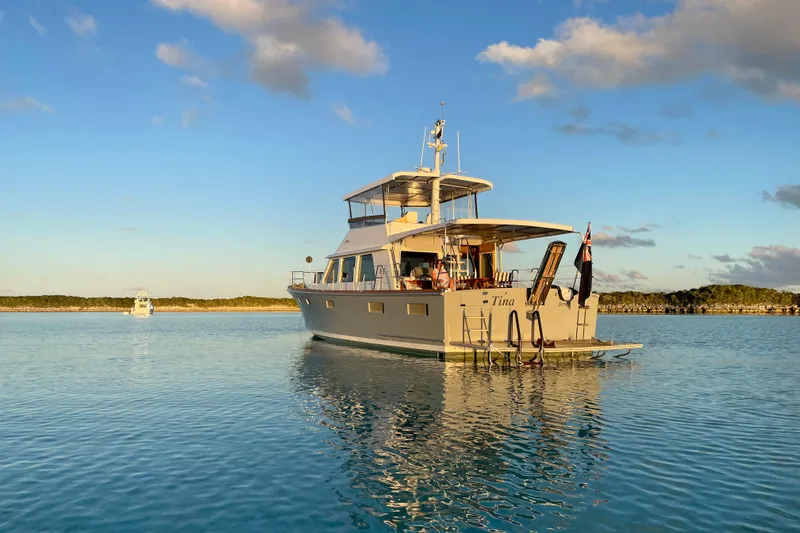 Slide: The Image of 1994 Lyman-Morse cruising yacht anchored in serene waters at sunset. - 20