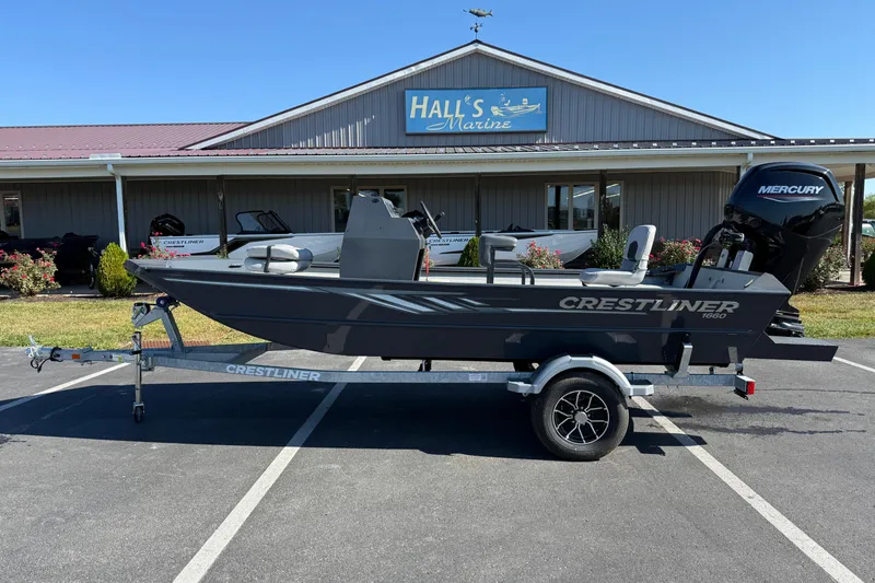 The Image of 2025 Crestliner 1660 Retriever FCC boat on trailer outside Hall's Marine. - 0