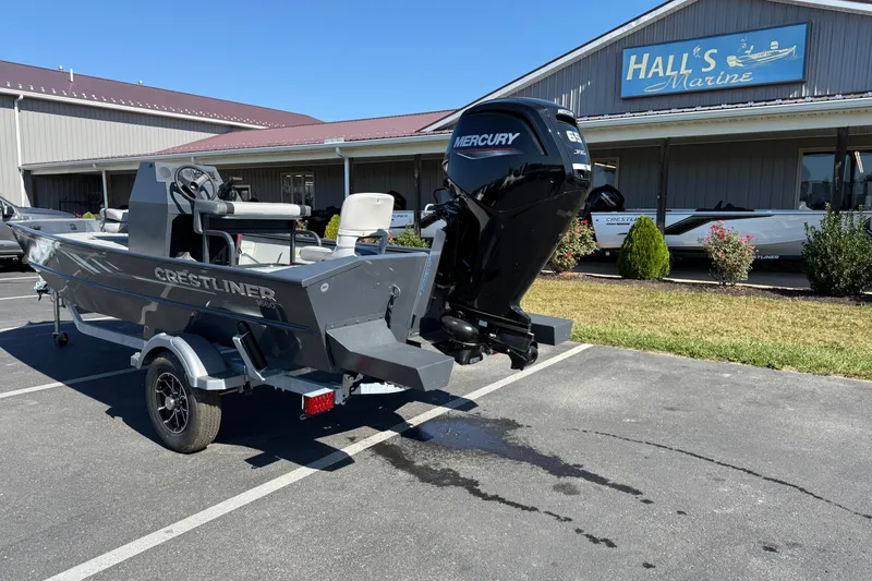 Slide: The Image of 2025 Crestliner 1660 Retriever FCC boat with Mercury engine at Hall's Marine dealership. - 2