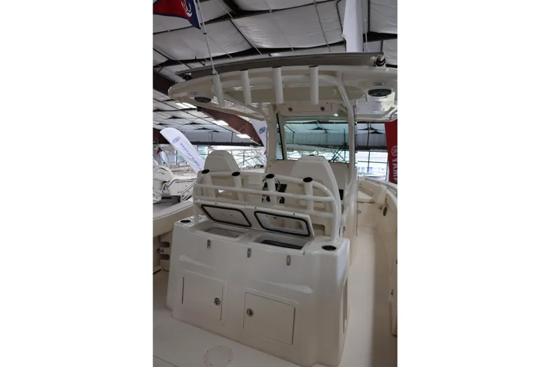 Slide: The Image of 2026 Grady-White Canyon 306 boat interior with seating and storage compartments. - 4