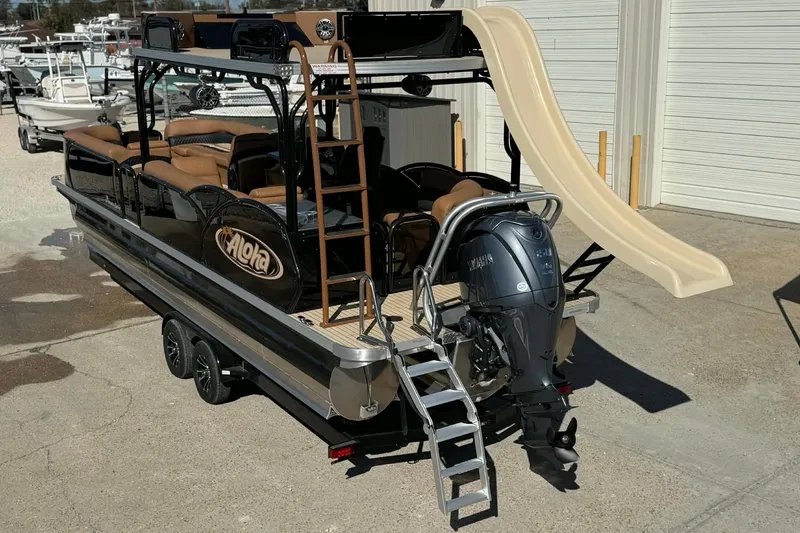 Slide: The Image of 2026 Aloha Paradise 300 Sundeck pontoon boat with slide and Yamaha outboard motor. - 13