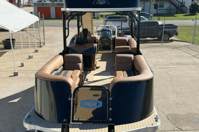 Slide: The Image of 2026 Aloha Paradise 300 Sundeck boat with spacious seating and modern design. - 16