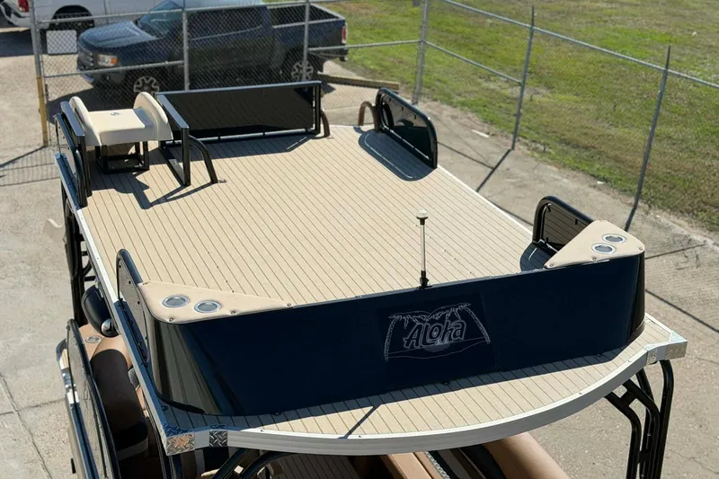 Slide: The Image of 2026 Aloha Paradise 300 Sundeck boat with spacious upper deck and sleek design. - 5
