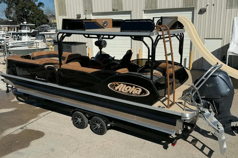 Slide: The Image of 2026 Aloha Paradise 300 Sundeck pontoon boat with slide and Yamaha engine. - 9
