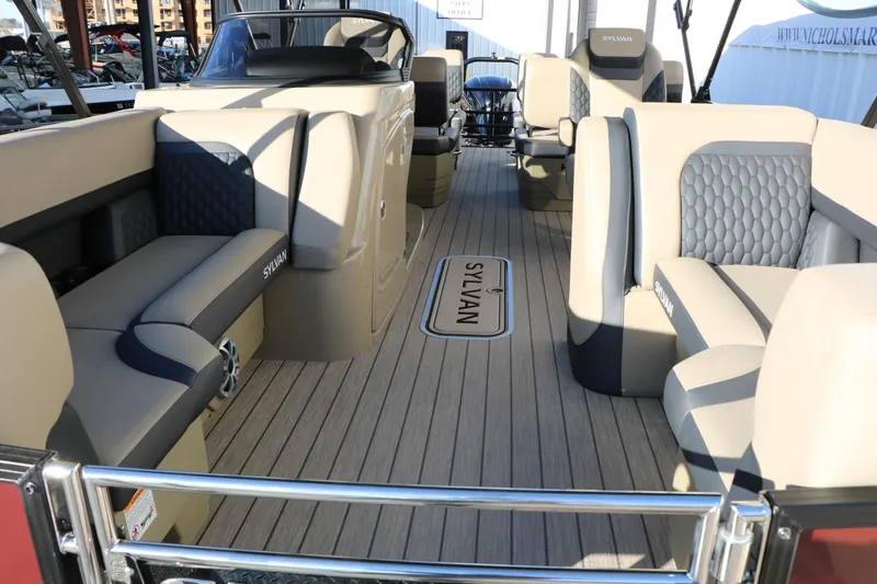 Slide: The Image of Interior of 2026 Sylvan L3 RLZ pontoon boat with luxurious seating and modern design. - 16