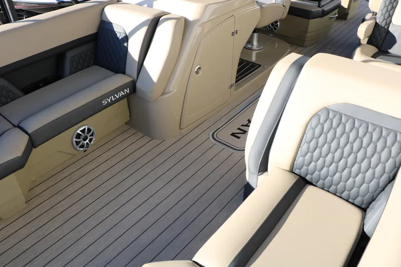 Slide: The Image of Luxurious interior of 2026 Sylvan L3 RLZ boat with plush seating and stylish design. - 19