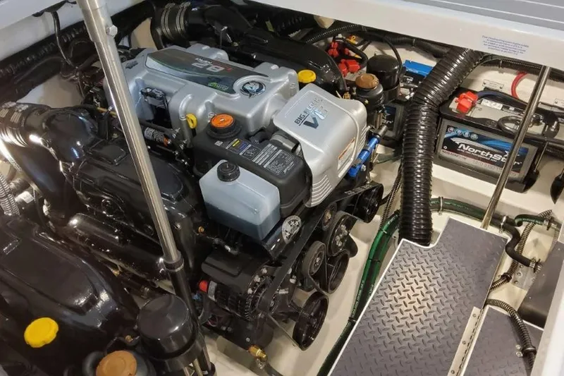 Slide: The Image of Engine compartment of 2023 Formula 350 Crossover Bowrider I/O, featuring a powerful V8 engine. - 18