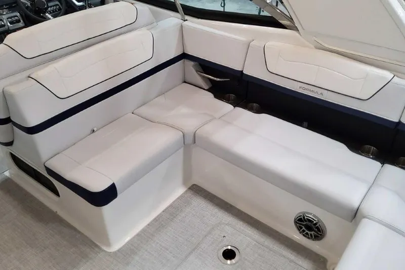 Slide: The Image of 2023 Formula 350 Crossover Bowrider I/O interior with luxurious seating and modern design. - 22