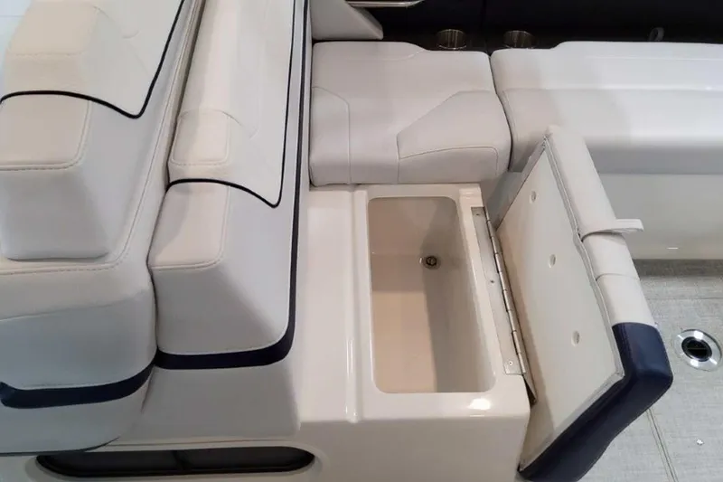 Slide: The Image of 2023 Formula 350 Crossover Bowrider I/O interior with open storage compartment. - 24