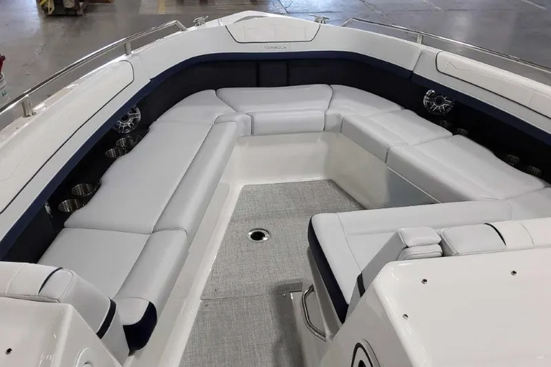 Slide: The Image of 2023 Formula 350 Crossover Bowrider I/O with spacious seating and modern design. - 35