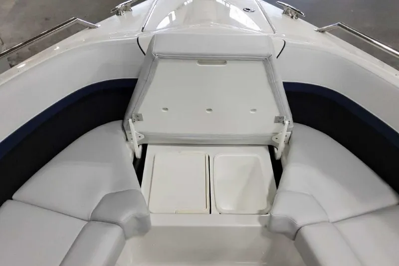 Slide: The Image of 2023 Formula 350 Crossover Bowrider I/O interior seating and storage area. - 37