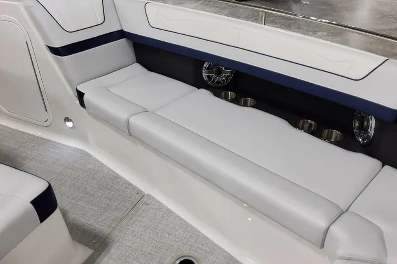 Slide: The Image of 2023 Formula 350 Crossover Bowrider I/O interior with sleek seating and cup holders. - 38