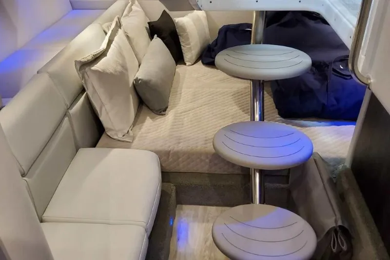 Slide: The Image of 2023 Formula 350 Crossover Bowrider I/O interior with modern seating and stylish cushions. - 43