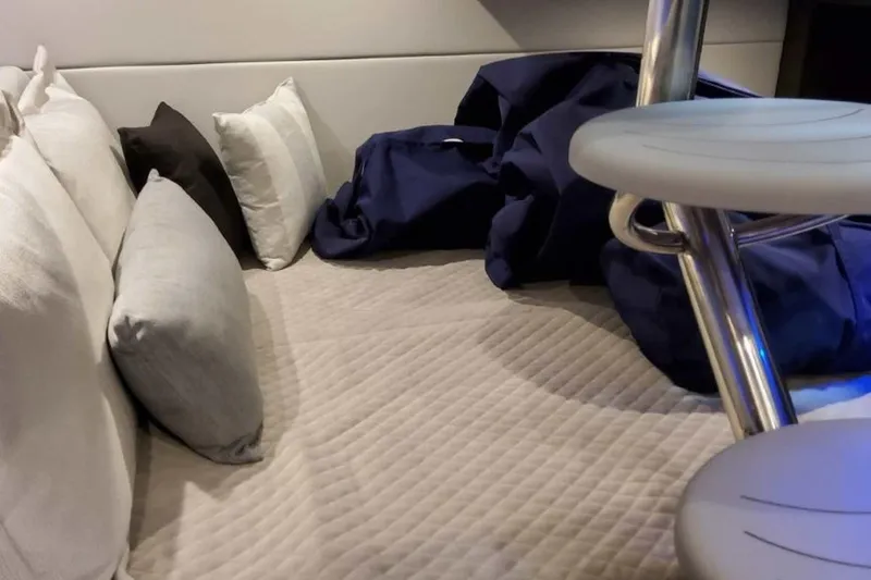 Slide: The Image of 2023 Formula 350 Crossover Bowrider I/O interior with cushions and seating area. - 44