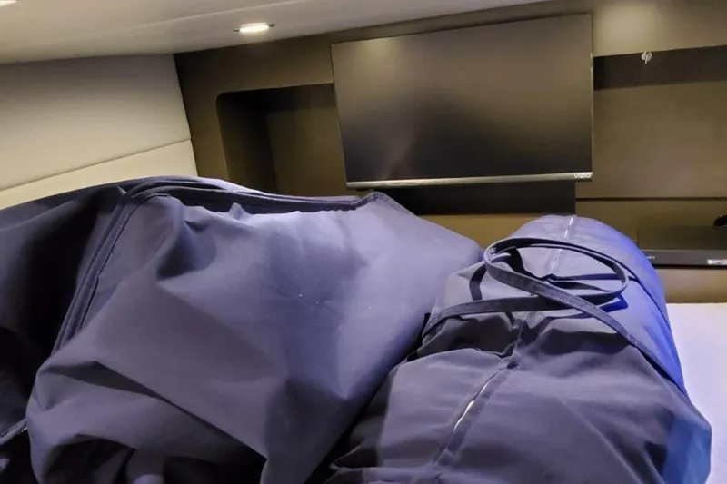 Slide: The Image of Interior of 2023 Formula 350 Crossover Bowrider I/O with TV and dark fabric. - 45