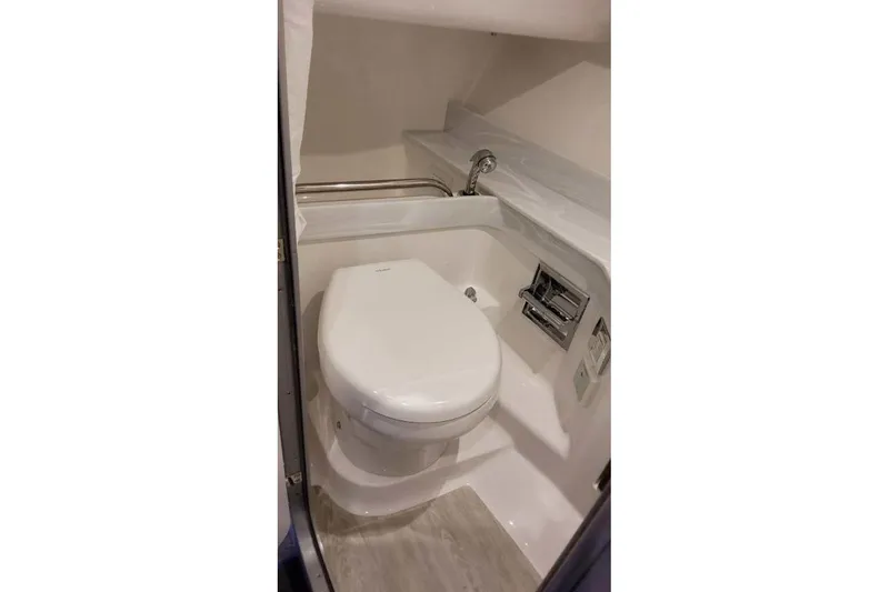 Slide: The Image of 2023 Formula 350 Crossover Bowrider I/O bathroom interior with modern fixtures. - 48