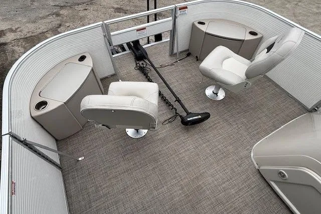 Slide: The Image of 2019 Bennington S 20 SFNP pontoon boat interior with seating and fishing setup. - 6