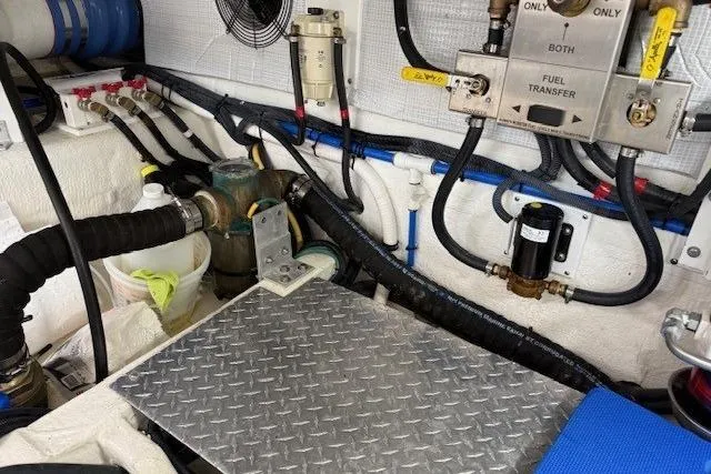 Slide: The Image of Engine room of 2019 Back Cove 41 boat with fuel transfer system and hoses. - 37