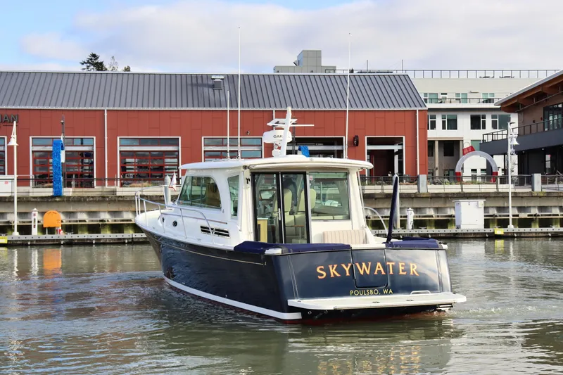 Slide: The Image of 2019 Back Cove 41 boat named Skywater docked at a marina. - 6