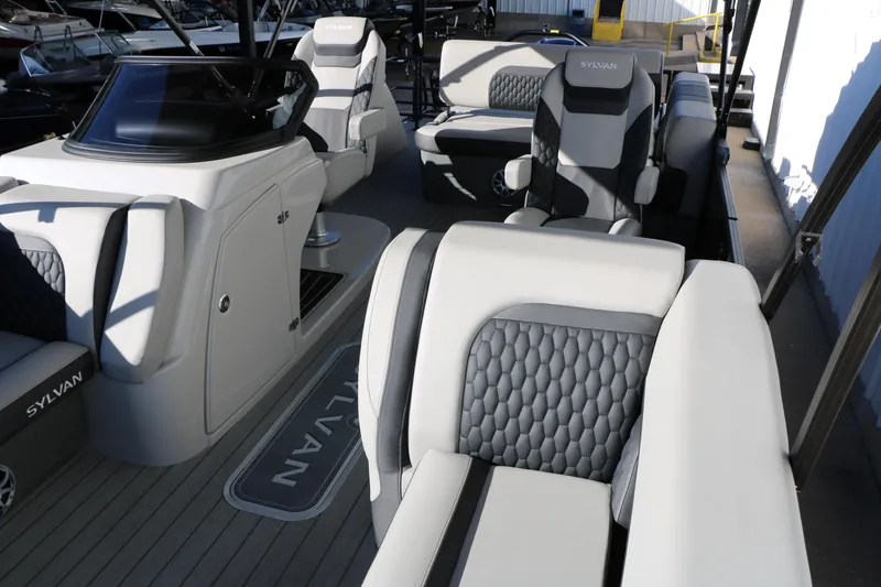 Slide: The Image of 2026 Sylvan L3 CLZ DH boat interior with modern seating and sleek design. - 13