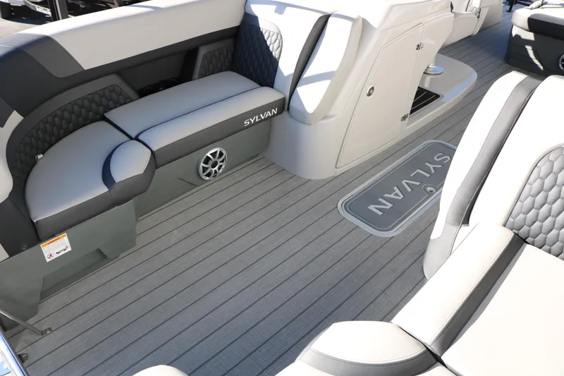 Slide: The Image of Luxurious interior of 2026 Sylvan L3 CLZ DH boat with stylish seating and flooring. - 14