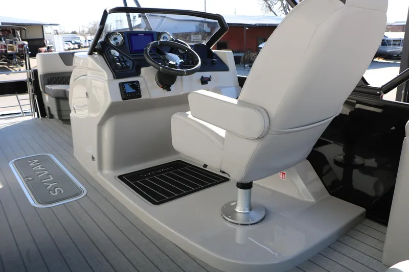 Slide: The Image of Interior of 2026 Sylvan L3 CLZ DH boat with modern helm and seating. - 21