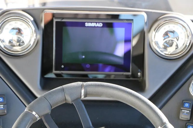 Slide: The Image of Dashboard of 2026 Sylvan L3 CLZ DH boat with Simrad display and gauges. - 30