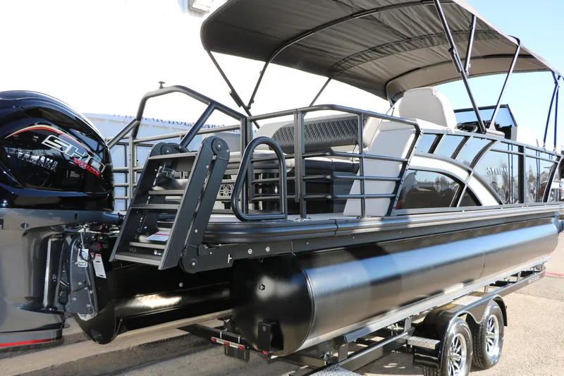 Slide: The Image of 2026 Sylvan L3 CLZ DH pontoon boat with sleek design and modern features. - 5