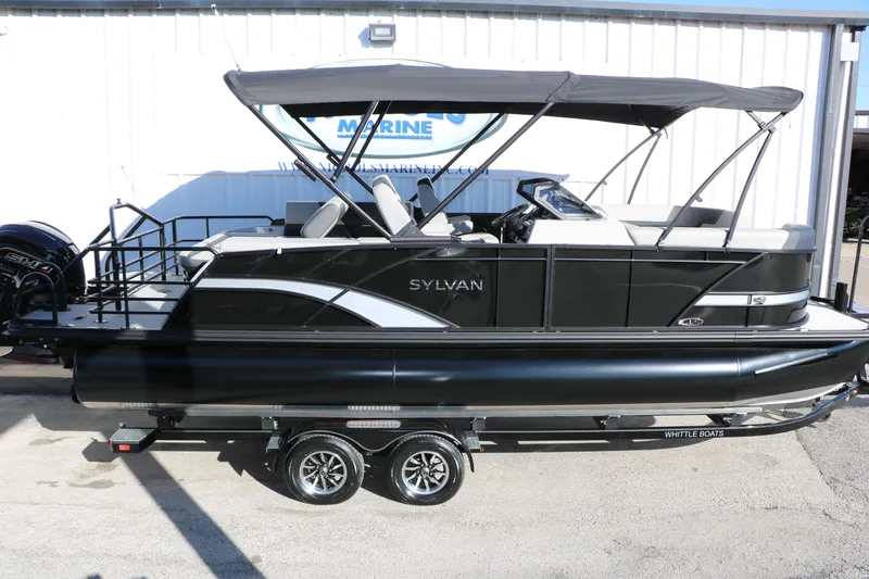 Slide: The Image of 2026 Sylvan L3 CLZ DH pontoon boat with canopy on trailer, side view. - 8
