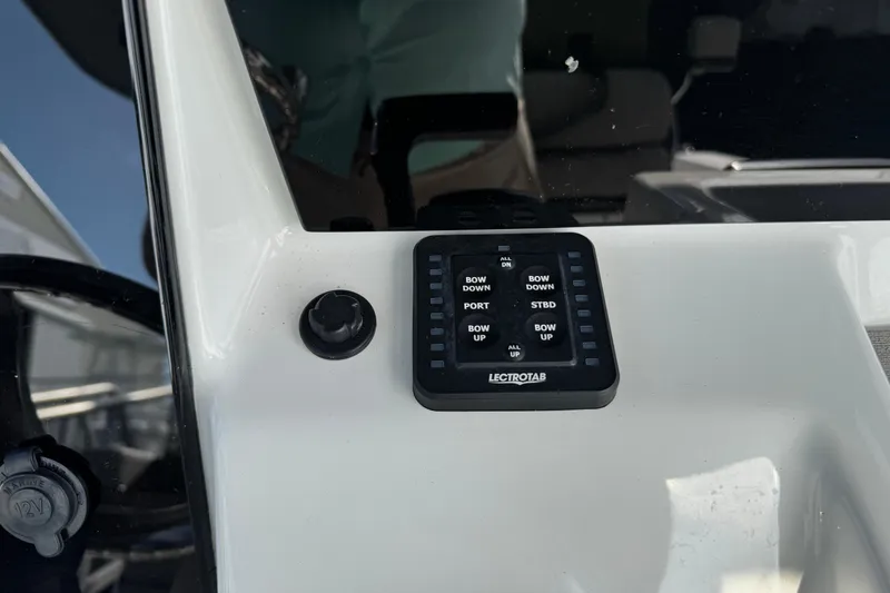 Slide: The Image of Control panel on 2023 Sea Pro 239 Deep V CC boat dashboard. - 13