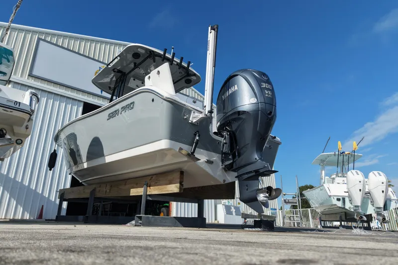 Slide: The Image of 2023 Sea Pro 239 Deep V CC boat with Yamaha 300 V6 engine displayed outdoors. - 29