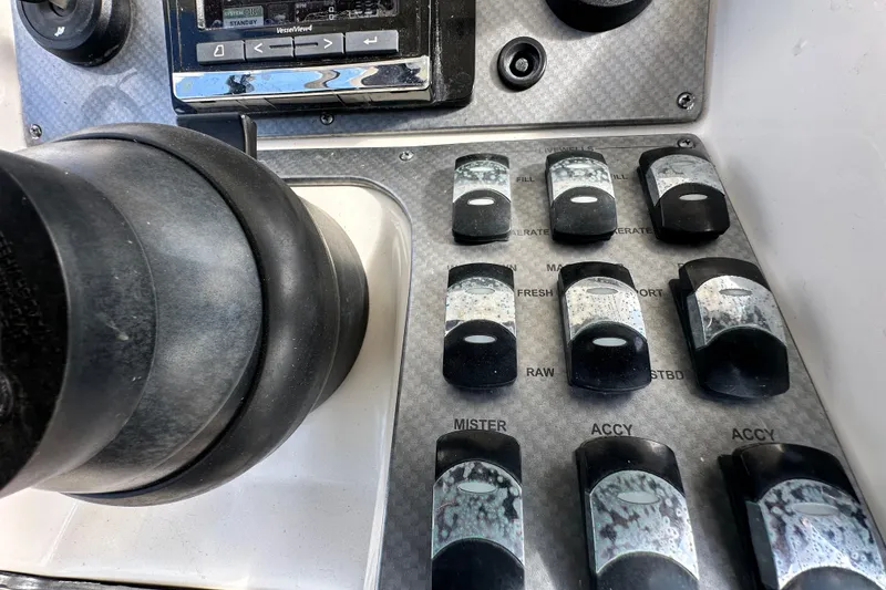 Slide: The Image of Close-up of 2018 Blackwood 27 Bayboat dashboard with logo in focus. - 23