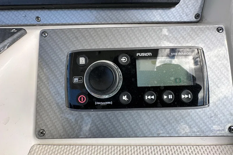 Slide: The Image of Control panel of a 2018 Blackwood 27 Bayboat with advanced navigation systems. - 29