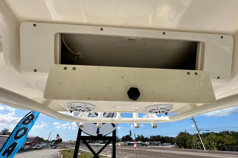 Slide: The Image of Control panel of a 2018 Blackwood 27 Bayboat with horn and 12V outlet. - 34