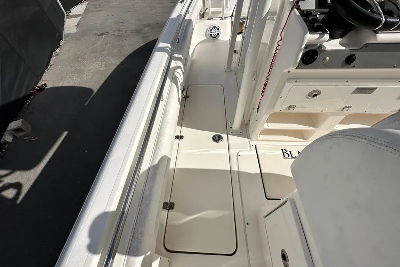Slide: The Image of 2018 Blackwood 27 Bayboat console with Garmin display and storage compartment. - 35
