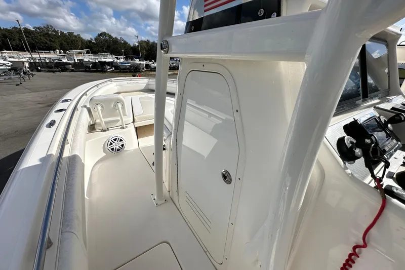 Slide: The Image of 2018 Blackwood 27 Bayboat interior with steering console and seating area. - 39
