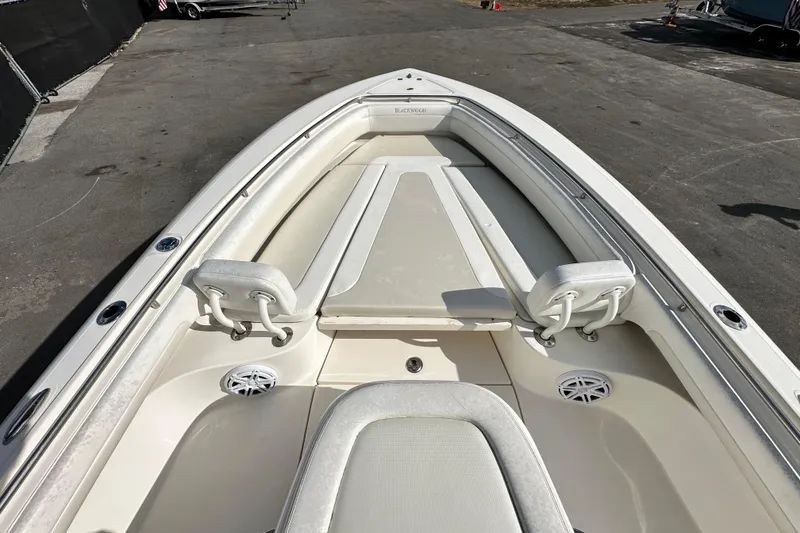 Slide: The Image of 2018 Blackwood 27 Bayboat interior with compact marine toilet and sink. - 45