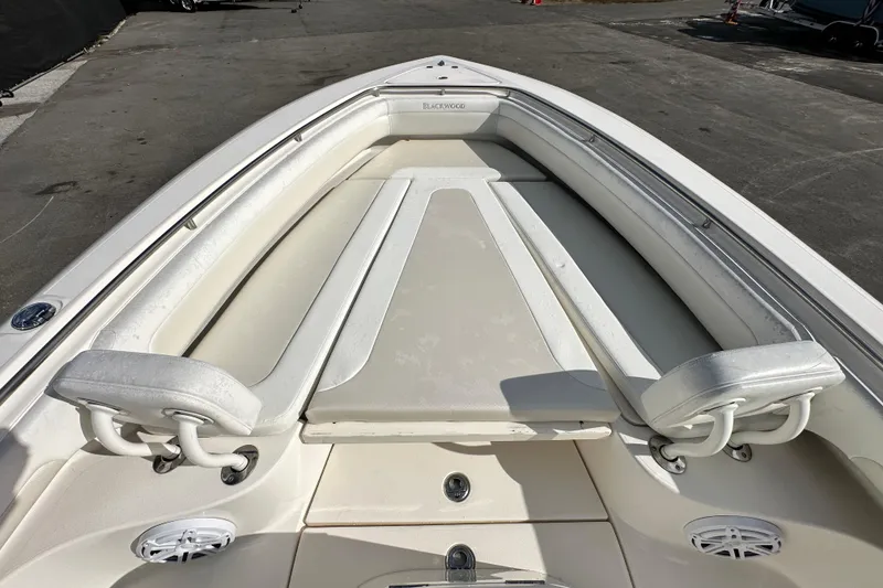 Slide: The Image of 2018 Blackwood 27 Bayboat interior with compact marine toilet setup. - 46