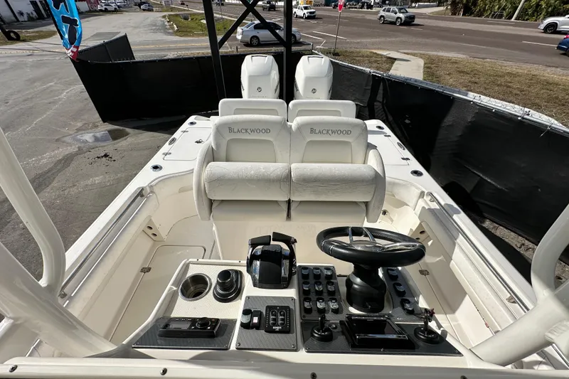 Slide: The Image of Anchor compartment of 2018 Blackwood 27 Bayboat, featuring chain and winch. - 68