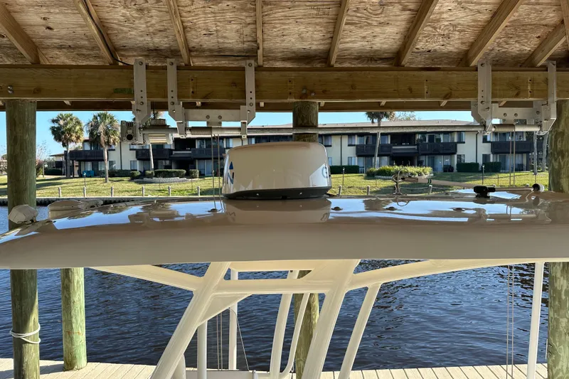 Slide: The Image of 2018 Blackwood 27 Bayboat on trailer, viewed from front, under clear blue sky. - 8