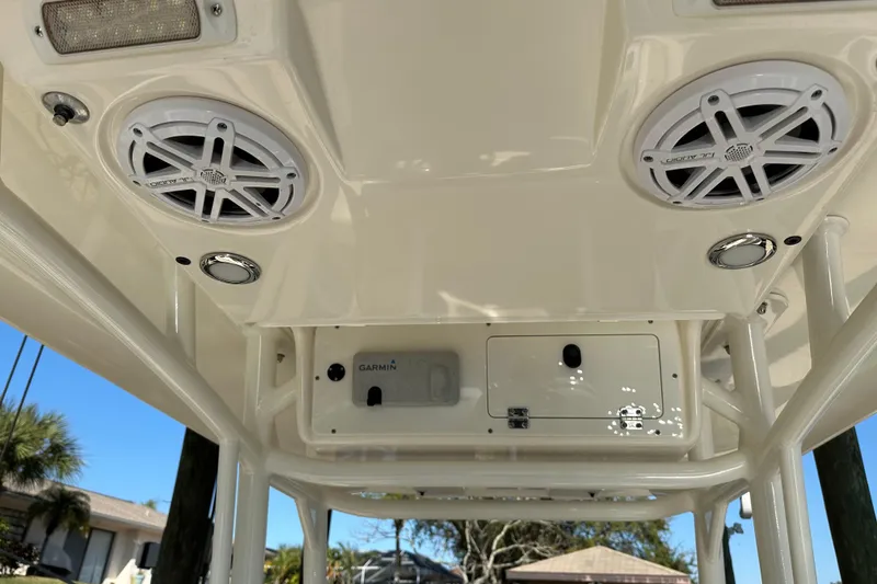 Slide: The Image of 2018 Blackwood 27 Bayboat on trailer under blue sky with clouds. - 9