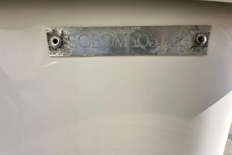 Slide: The Image of 2018 Blackwood 27 Bayboat hull identification number plate. - 91