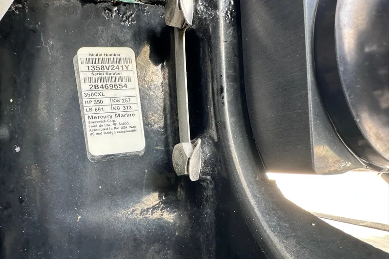 Slide: The Image of Label on 2018 Blackwood 27 Bayboat, showing Mercury Marine engine specifications and serial number. - 92