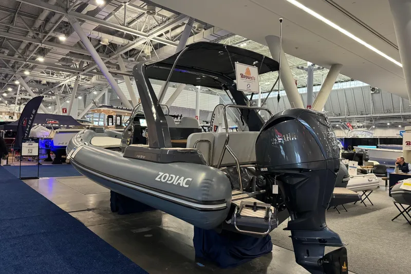 Slide: The Image of 2026 Zodiac Medline 7.5 boat displayed at an indoor exhibition, featuring a Yamaha outboard motor. - 6