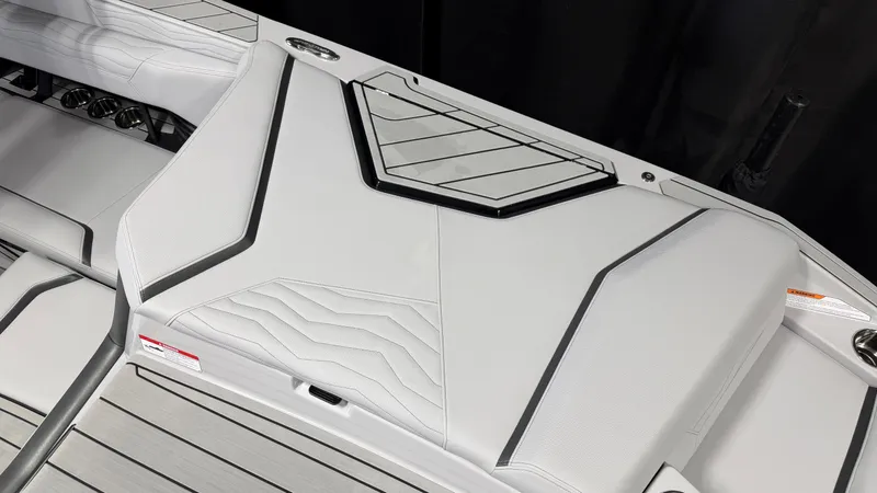Slide: The Image of The image shows the sleek, modern design of the Nautique Super Air Nautique G23 boat. - 17